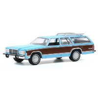 Greenlight 1:64 Estate Wagons Series 5 - 1983 Mercury Grand Marquis Colony Park in Light Cadet Blue Iridescent with Woodgrain