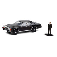 Greenlight 1:64 The Hobby Shop Series 10 - 1987 Ford LTD Crown Victoria in Black with Man in Black Suit