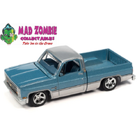 Auto World 1:64 Premium 2023 Release 2B - 1985 Chevy Silverado Pickup Truck (Lowered Version) (Light Blue Poly with Silver Lower Sides & Roof)