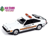Auto World 1/64 Premium 2024 Release 2B - 1983 Toyota Celica Supra White w/Toyota Grand Prix of Long Beach Official Pace Car Graphics & Roof Lightbar