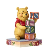 JIM SHORE DISNEY TRADITIONS - POOH WITH BABY BLOCKS - WORD PLAY