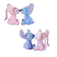 Grand Jester Studios – Flocked Stitch & Angel Kissing Statues
