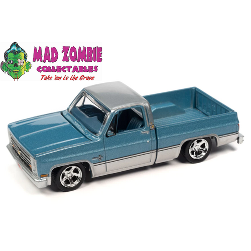 Auto World 1:64 Premium 2023 Release 2B - 1985 Chevy Silverado Pickup Truck (Lowered Version) (Light Blue Poly with Silver Lower Sides & Roof)